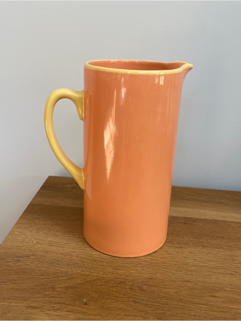Tall Ceramic Pitcher in Light Coral orange with Yellow Handle